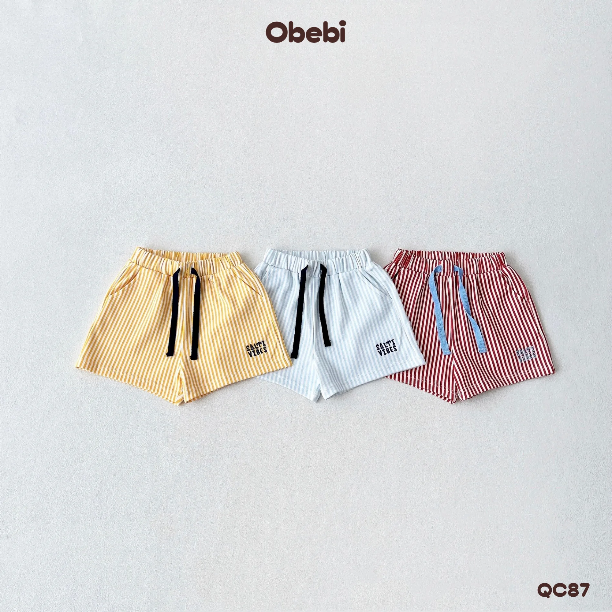 QC87 – Quần Đùi Trẻ Em Mùa Hè Kẻ Sọc Đi Biển Obebi
