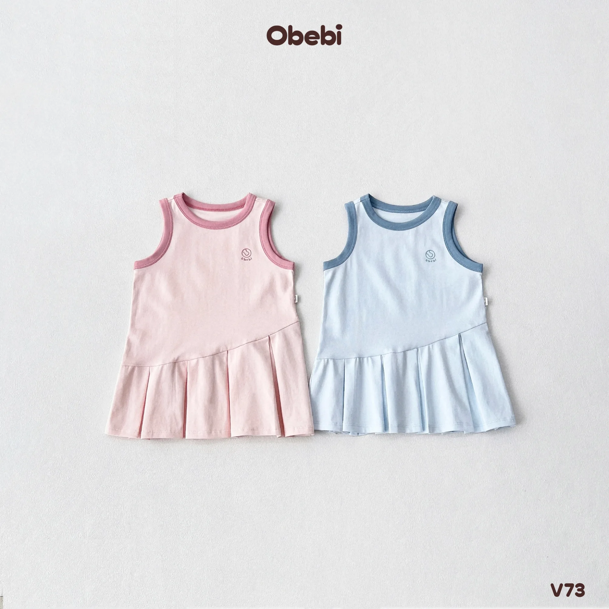V73 – Váy Ba Lỗ Bé Gái Mùa Hè Xếp Ly Lệch Obebi