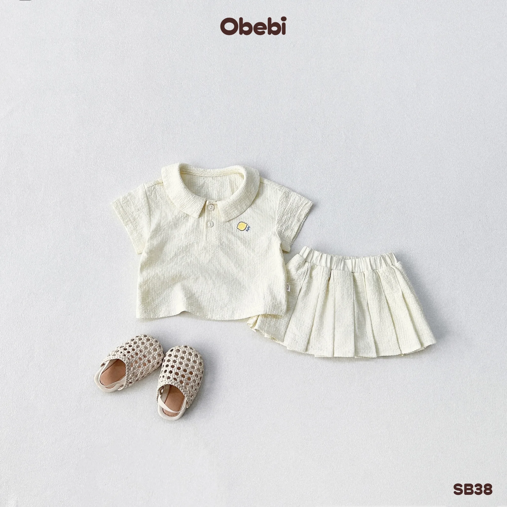 SB38 – Bộ Sơ Mi Cộc Tay Bé Gái Mùa Hè Chân Váy Xếp Ly Obebi