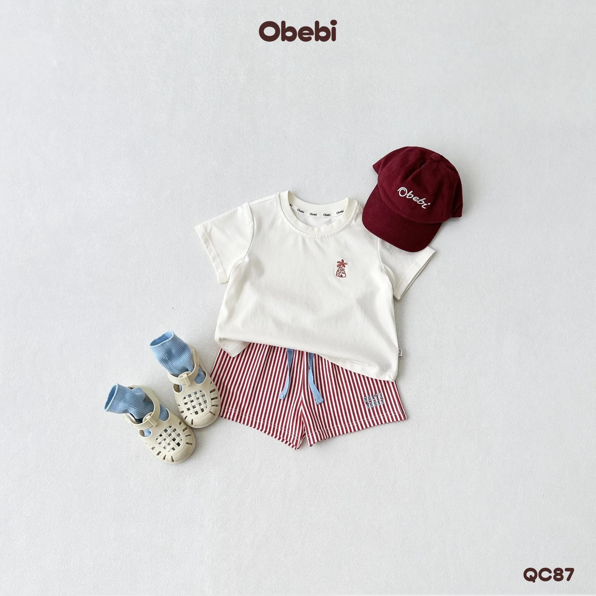 QC87 – Quần Đùi Trẻ Em Mùa Hè Kẻ Sọc Đi Biển Obebi
