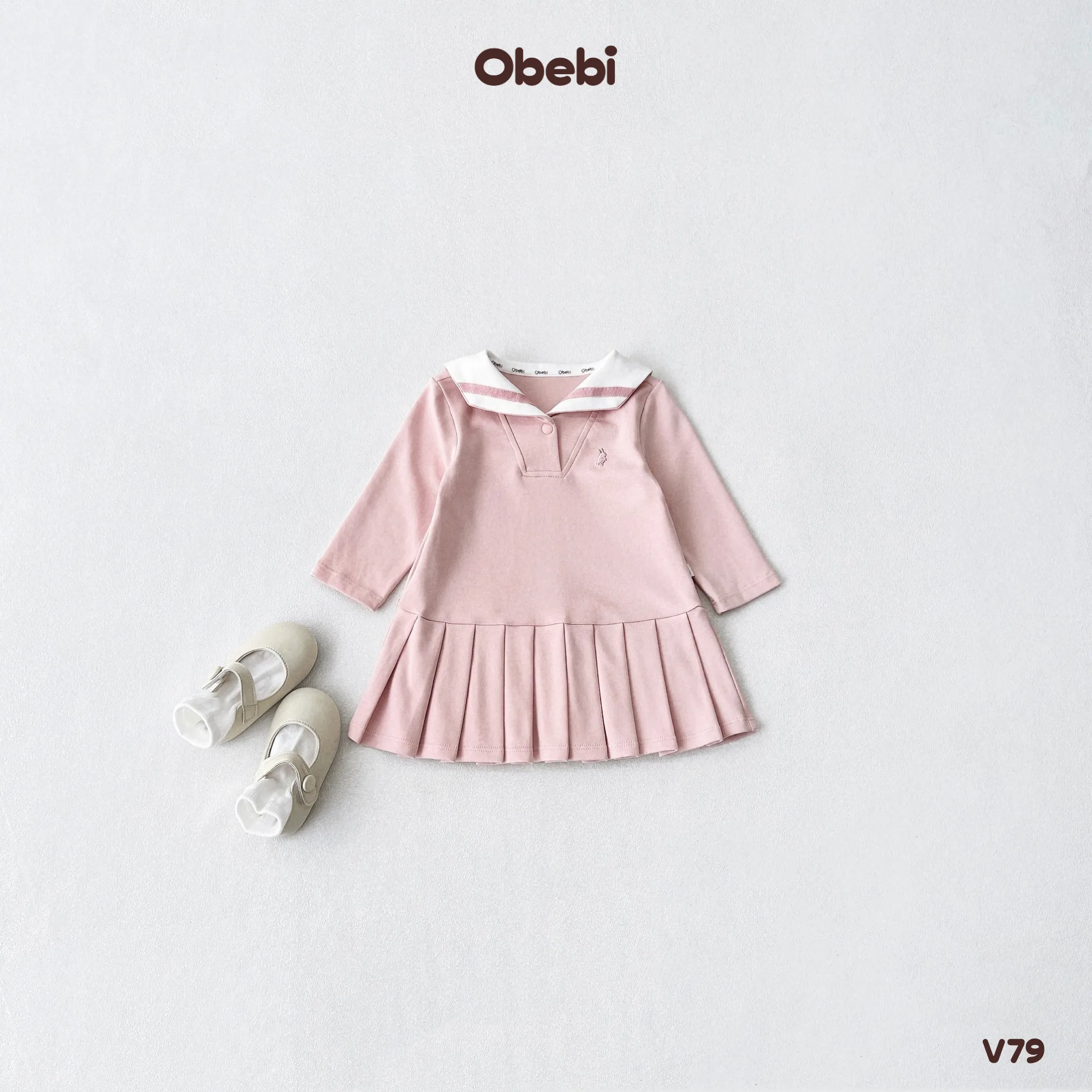 V79 – Váy Xếp Ly Dài Tay Trẻ Em Thu Đông Cổ Thủy Thủ Obebi